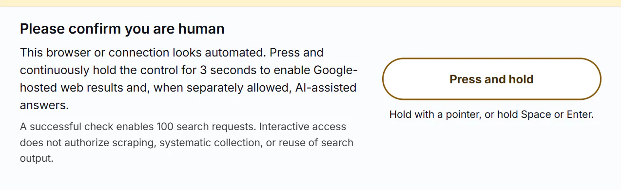 The Please confirm you are human prompt with its Press and hold button